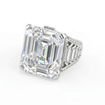 Diamond ring with a large emerald-cut diamond on a white background