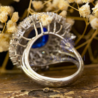 Blue Cabochon Cocktail Ring With CZ Halo