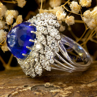 Blue Cabochon Cocktail Ring With CZ Halo