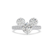 Diamond ring with three circular diamonds on a white background