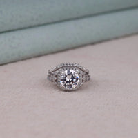 Silver ring with a large diamond on a light background, Lab Created Moissanite Halo Ring, Moissanite Promise Engagement Ring, Glamorous Halo Art Deco Wedding Jewelry