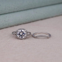 Two silver rings with gemstones on a neutral background, Moissanite Anniversary Wedding Set, Unique Round Moissanite Engagement Ring, Eco Friendly Moissanite Bridal Set