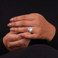 Close-up of a hand wearing a diamond ring on a black background, Round Cut Moissanite Halo Ring, Moissanite Bridal Ring Set For Women, Classic Art Deco Engagement Ring