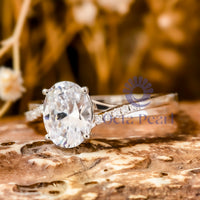 Twisted Shank Oval Moissanite Engagement Ring