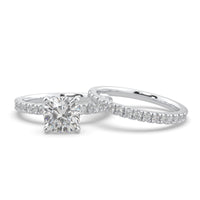 Diamond ring with a white background, Cushion & Round Moissanite Wedding Bridal Ring Set 14K Gold