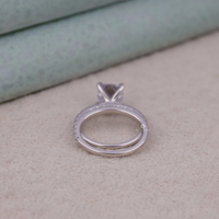 Silver ring with a diamond on a textured surface, Moissanite Bridal Jewelry, Durable Moissanite Wedding Ring Set, Moissanite Promise Ring Set For Brides