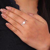 Hand wearing a diamond ring on a dark background, Lab Created Moissanite Ring, Eco Friendly Engagement Ring, Sustainable Bridal Jewelry, Moissanite Anniversary Gift