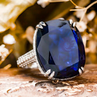 Blue Cushion Stone Hidden Halo Engagement Ring