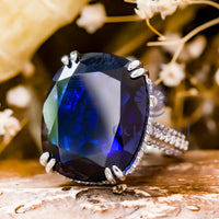 Blue Cushion Stone Hidden Halo Engagement Ring