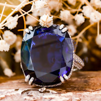 Blue Cushion Stone Hidden Halo Engagement Ring