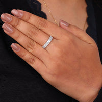 Hand wearing a diamond ring on a black background, Baguette Moissanite Wedding Band, Round Moissanite Eternity Ring, Dot Dash Moissanite Band, Half Eternity Ring for Women