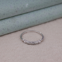 Silver ring with intricate design on a textured surface, Edwardian Vintage Ring, Round Cut Moissanite Ring, Timeless Moissanite Band, Seven Moissanite Stone Band