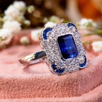 Blue Emerald Cut CZ Stone Bezel Set Double Halo Ring