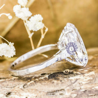 Oval & Tapered Baguette Three Stone Wedding Ring