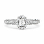 Diamond ring with a halo and pavé setting on a white background