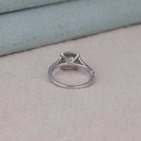 Silver ring with a diamond on a light gray surface, Statement Split Shank Wedding Ring, Romantic Cushion Cut Bridal Engagement Ring, Durable Moissanite Wedding Ring Set