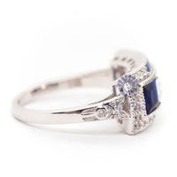 Radiant & Blue Princess CZ Three Stone Halo Ring