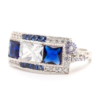 Radiant & Blue Princess CZ Three Stone Halo Ring