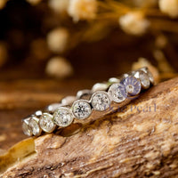 Round Moissanite Bubble Bezel Set Eternity Band