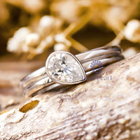 Pear Cut Moissanite Bezel Set Engagement Ring