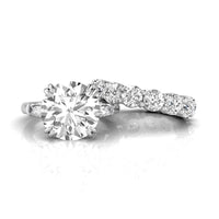 Round Cut CZ Three Stone With Full Eternity Band