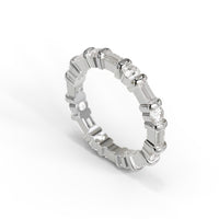 Silver ring with diamonds on a white background, Round & Baguette Moissanite Dot Dash Eternity Band
