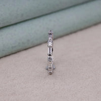 Silver ring with embedded diamonds on a textured surface, Classic Baguette and Round Eternity Band, 14K Gold Moissanite Eternity Band, Eco Friendly Moissanite Wedding Ring