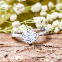 half bezel moissanite ring