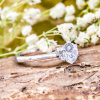 half bezel moissanite ring