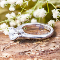 half bezel moissanite ring