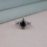 Black Oval Cut Cubic Zirconia Victorian halo statement ring with ornate scrollwork detailing and vintage-inspired design