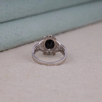 Black Oval Cut Cubic Zirconia Victorian halo statement ring with ornate scrollwork detailing and vintage-inspired design