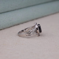 Black Oval Cut Cubic Zirconia Victorian halo statement ring with ornate scrollwork detailing and vintage-inspired design