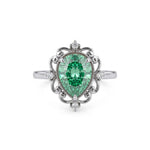 metalocolor:white Green pear cut moissanite vintage engagement ring with decorative scrollwork accents and round accent stones