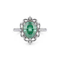 metalocolor:white Green pear cut moissanite vintage engagement ring with decorative scrollwork accents and round accent stones