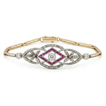 10K yellow and white gold floral bracelet with white Moissanite center stone and colorful CZ accents