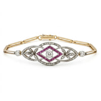 10K yellow and white gold floral bracelet with white Moissanite center stone and colorful CZ accents