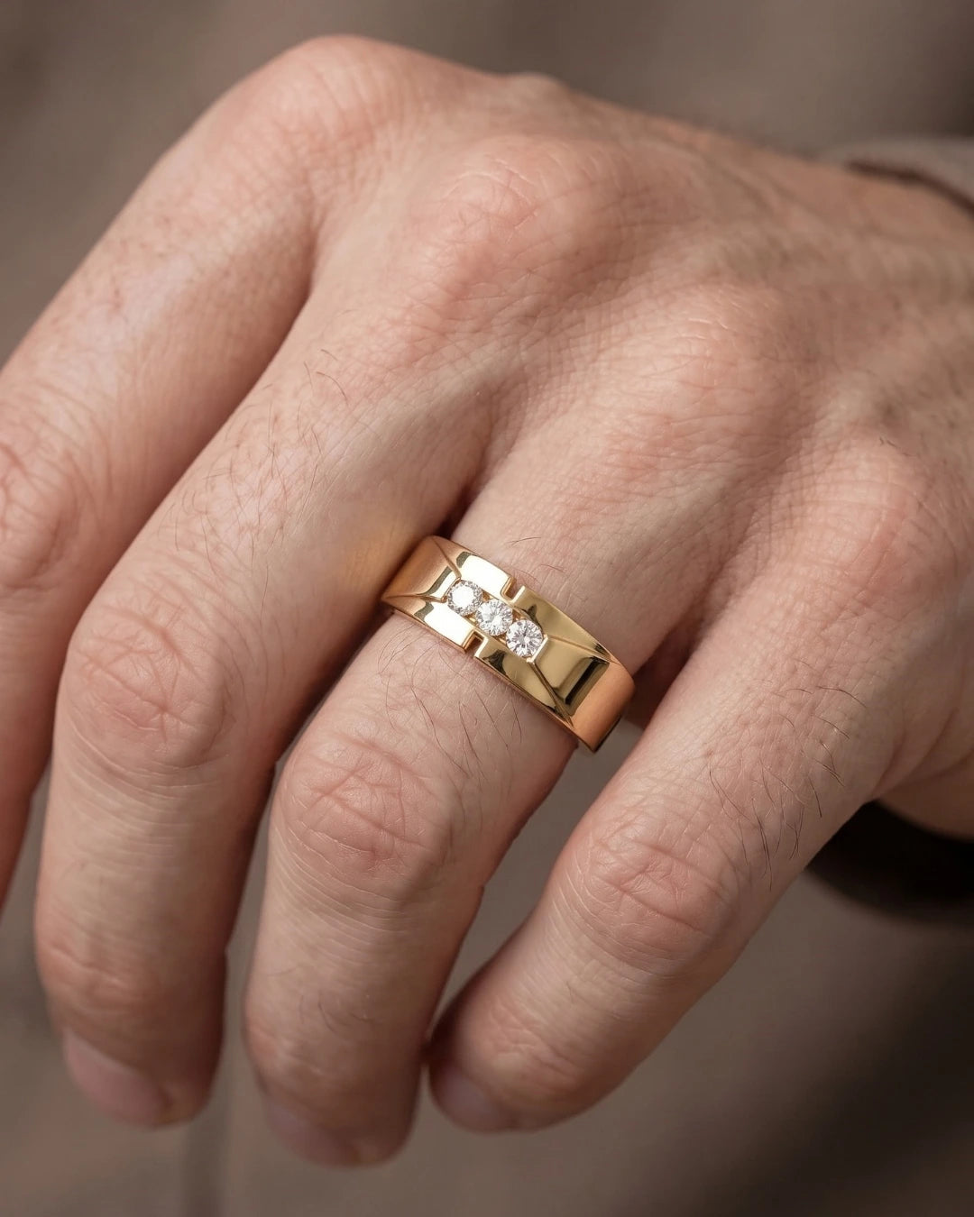 Men's lab-grown diamond ring worn on a hand