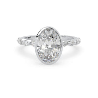 Oval bezel set lab grown diamond pave engagement ring with 3.50 carat center diamond in white gold