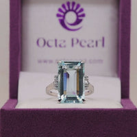 Emerald Cut Blue CZ Statement Ring With Side Stones