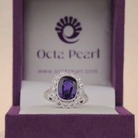 Blue Sapphire Cushion Cut Halo Engagement Ring with Round CZ Accent Stones