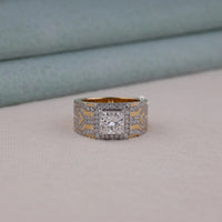 Men's princess cut Moissanite halo ring with wide geometric pavé band and statement luxury design in yellow tone metal.