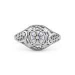 Vintage filigree engagement ring featuring a 5.00 mm round cut moissanite center stone in a decorative prong setting with intricate openwork design