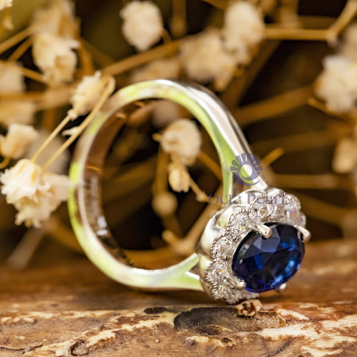 Oval Sapphire Engagement Ring with Diamond Floral Halo