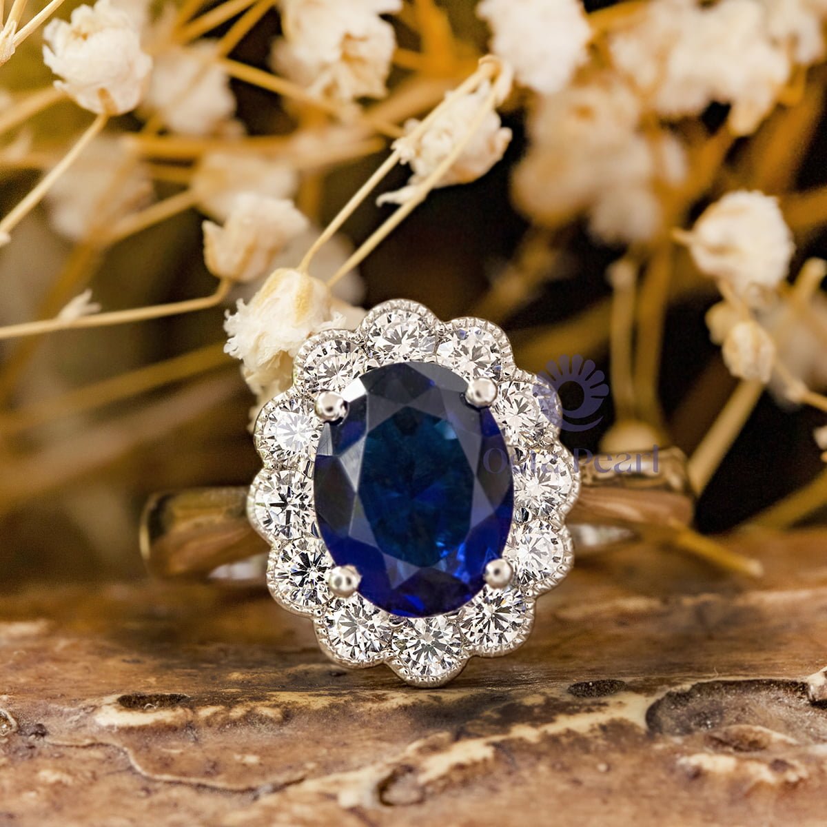Oval Sapphire Engagement Ring with Diamond Floral Halo