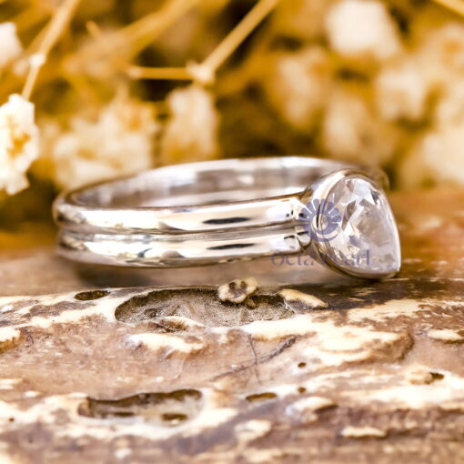 Pear Cut Moissanite Bezel Set Engagement Ring