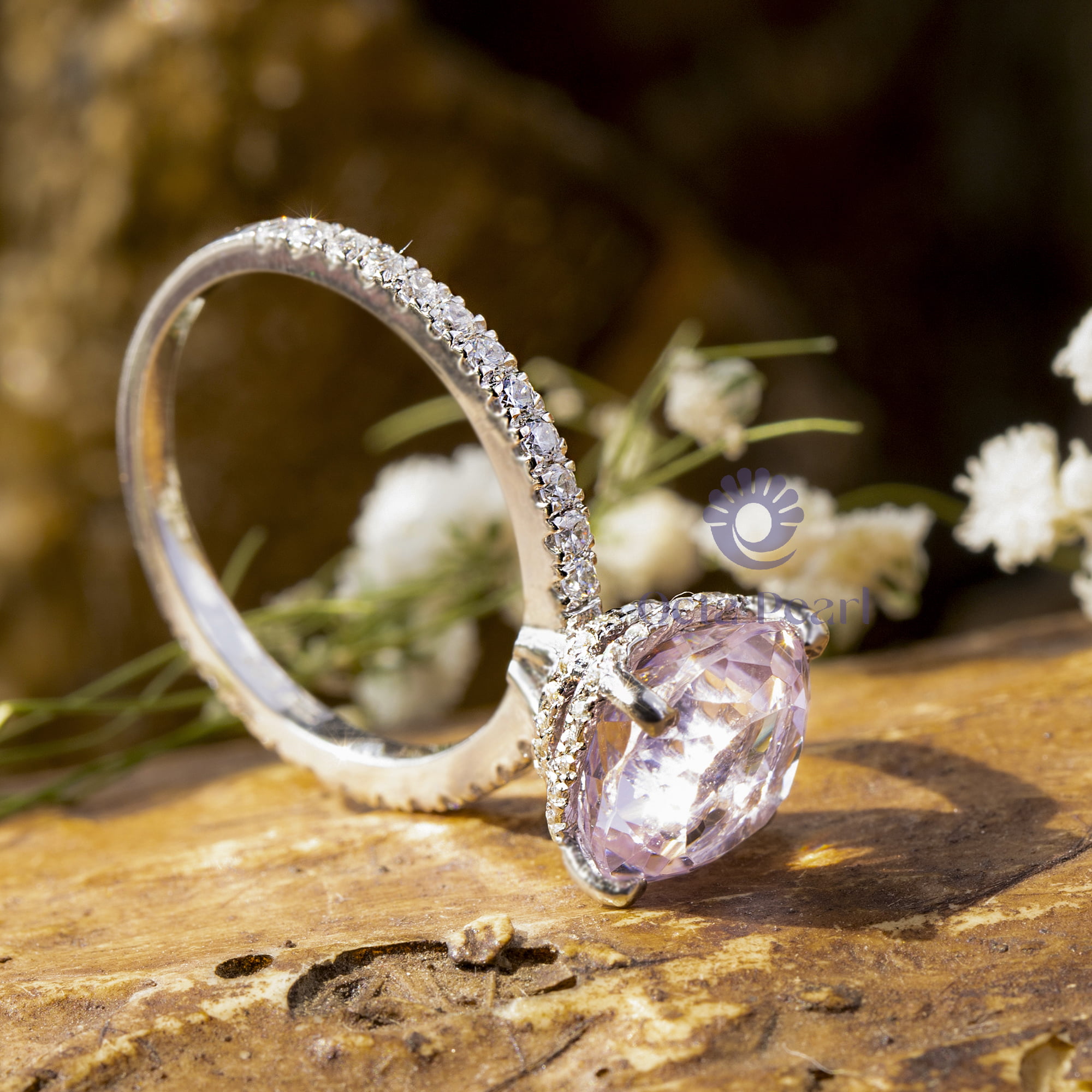 pink stone round engagement ring