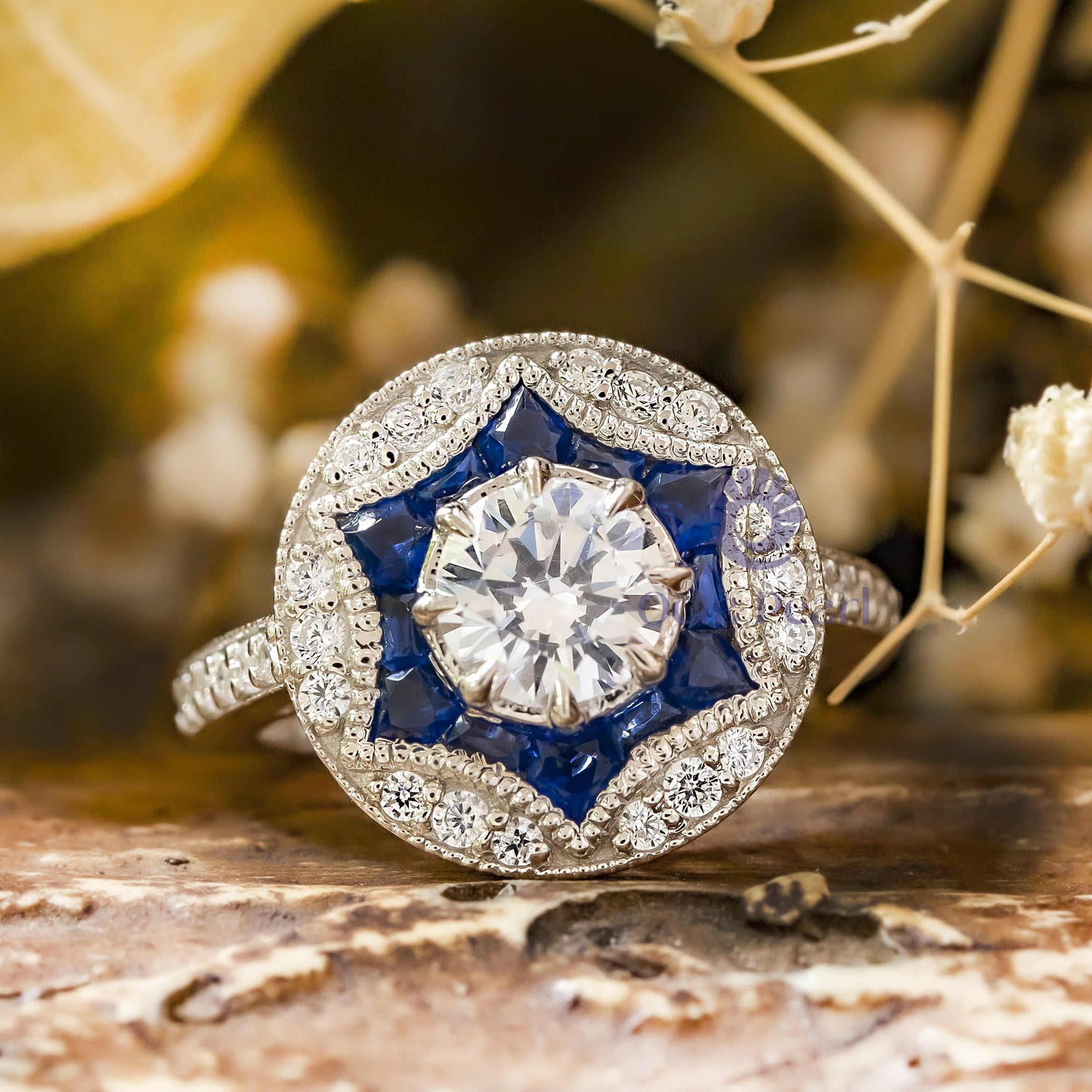Art Deco-inspired Blue Sapphire Halo Ring