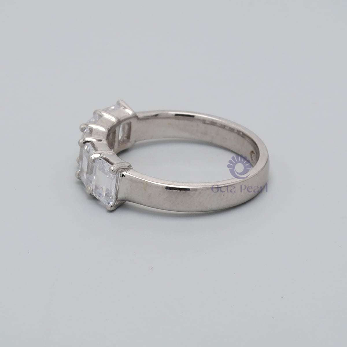 5-stones Emerald Cut Engagement Ring