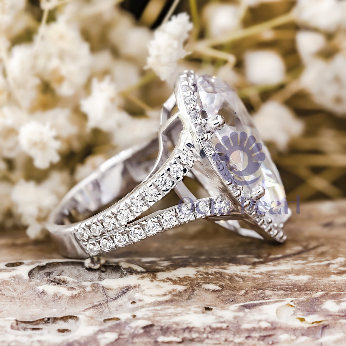 Pear Shaped Moissanite Ring with Halo